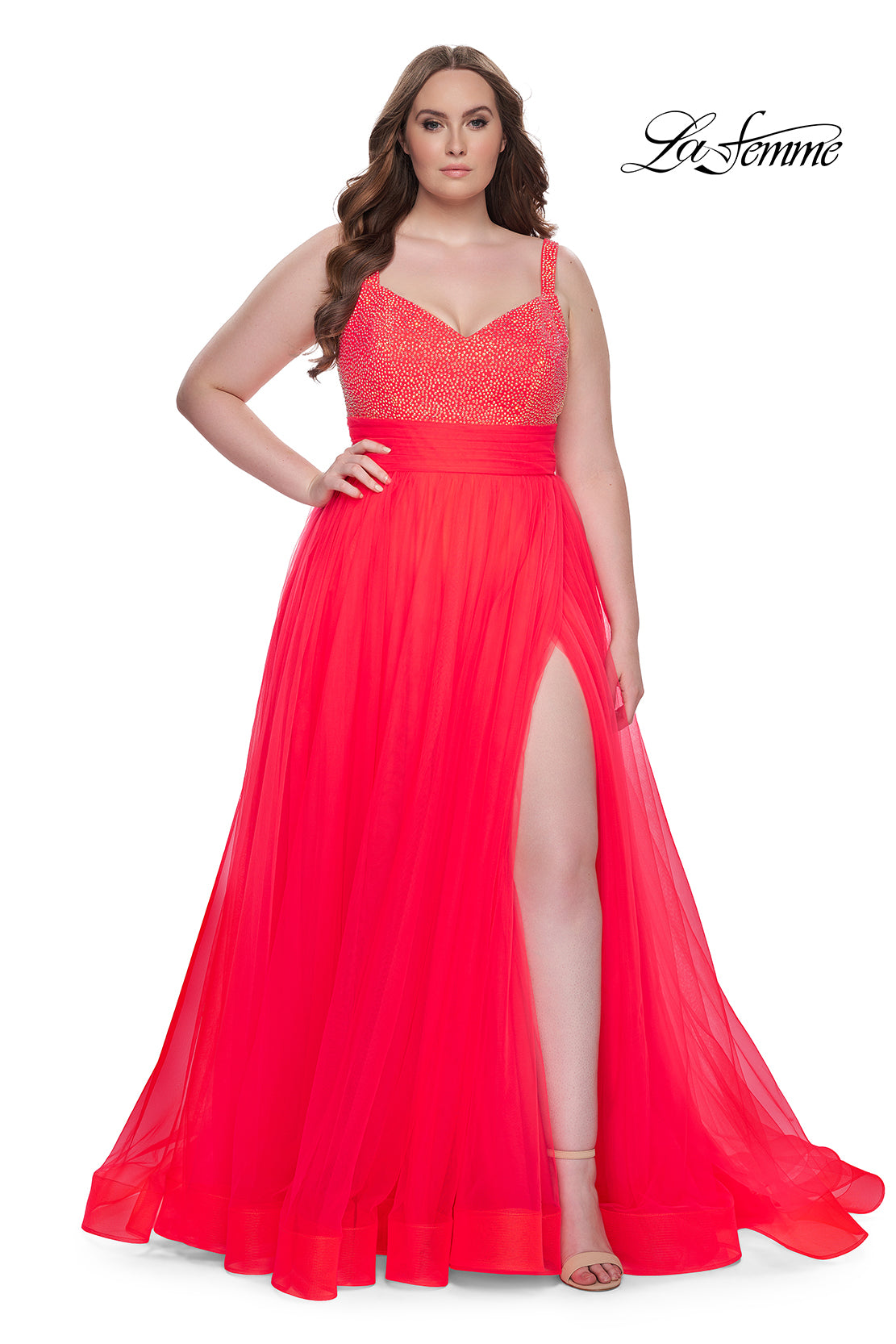 Shop La Femme 31251 A-line tulle plus size prom dress with rhinestone embellished bodice. High slit in the skirt that can also be hidden. Back zipper closure. B Chic Fashions Shop La Femme 31251 A-line tulle plus size prom dress with rhinestone embellished bodice. High slit in the skirt that can also be hidden. Back zipper closure. B Chic Fashions