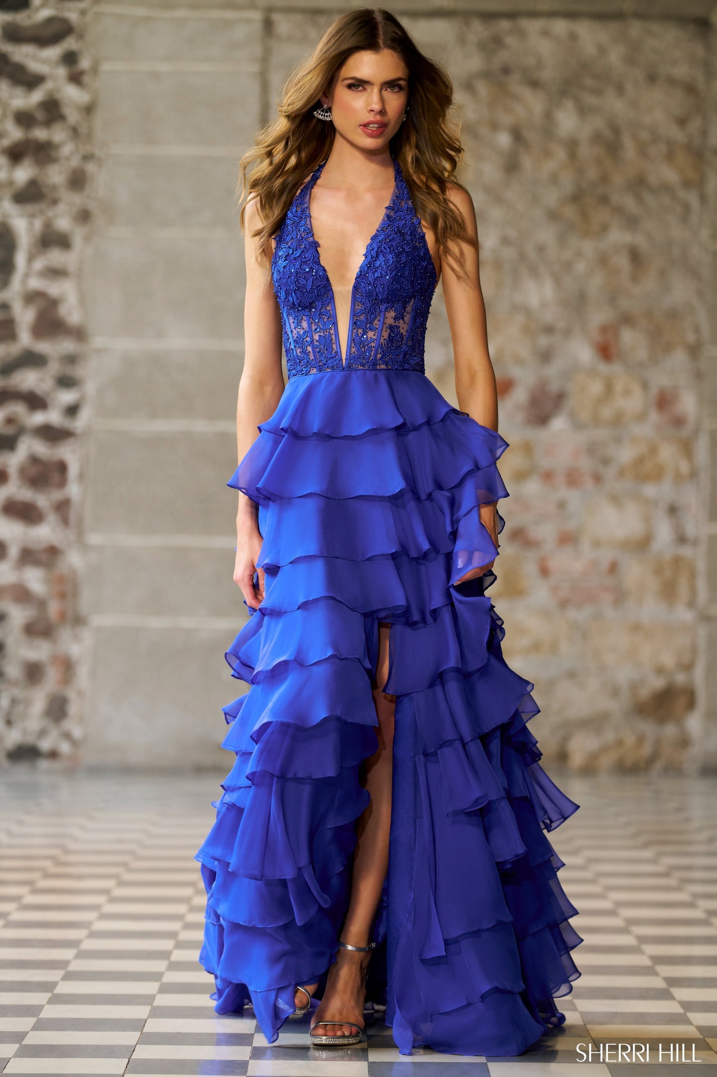 Sherri Hill 56656 Halter Gown with Leaf Lace Corset Bodice and a Ruffle Chiffon Skirt with Slit